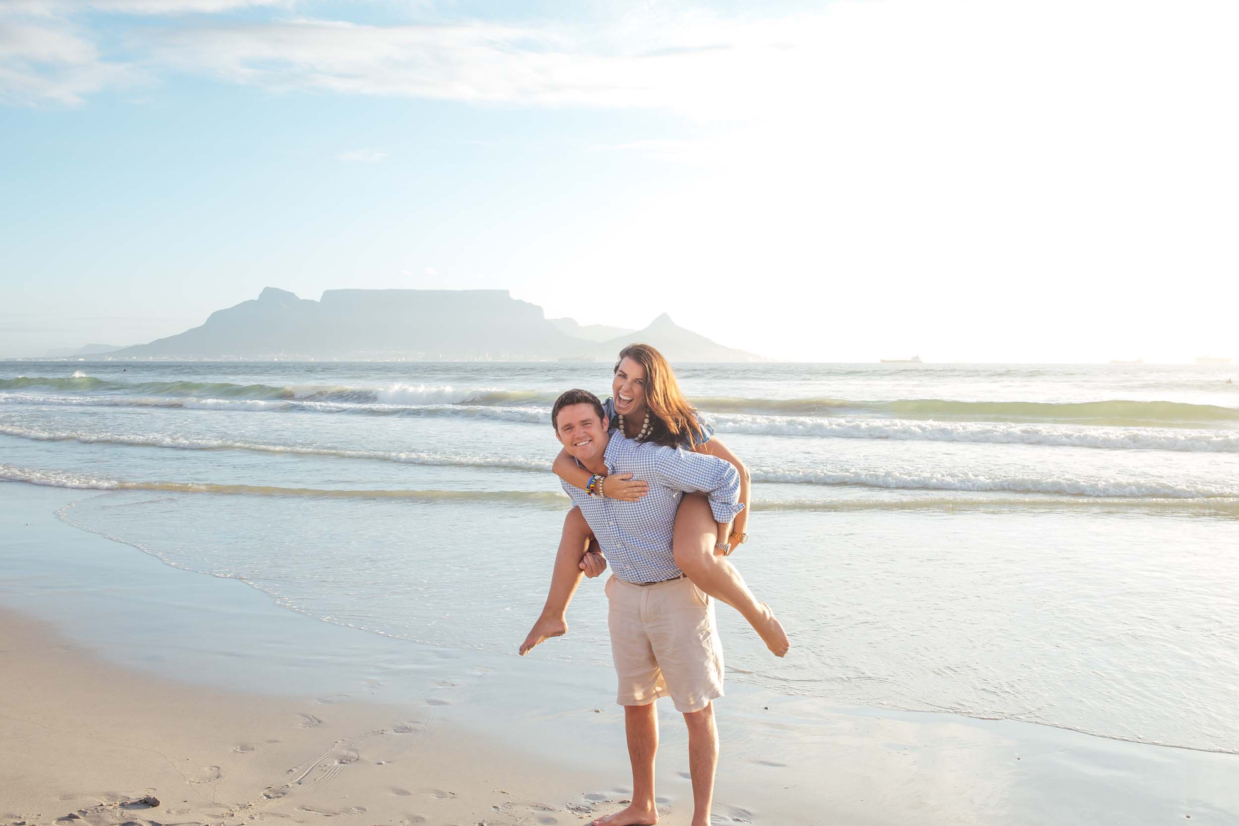 Couple enjoying Cape Town with Table Mountain behind them