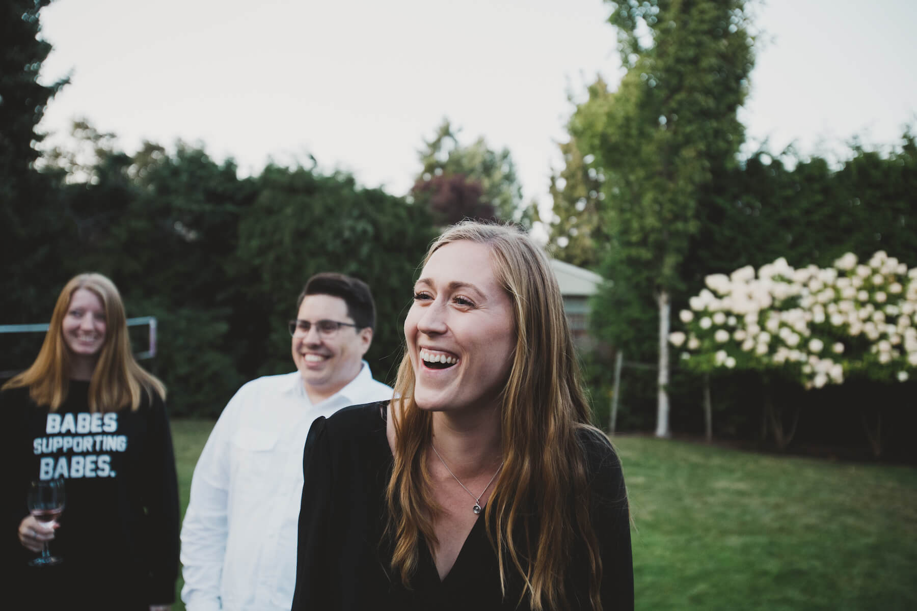 Girl laughing at garden party