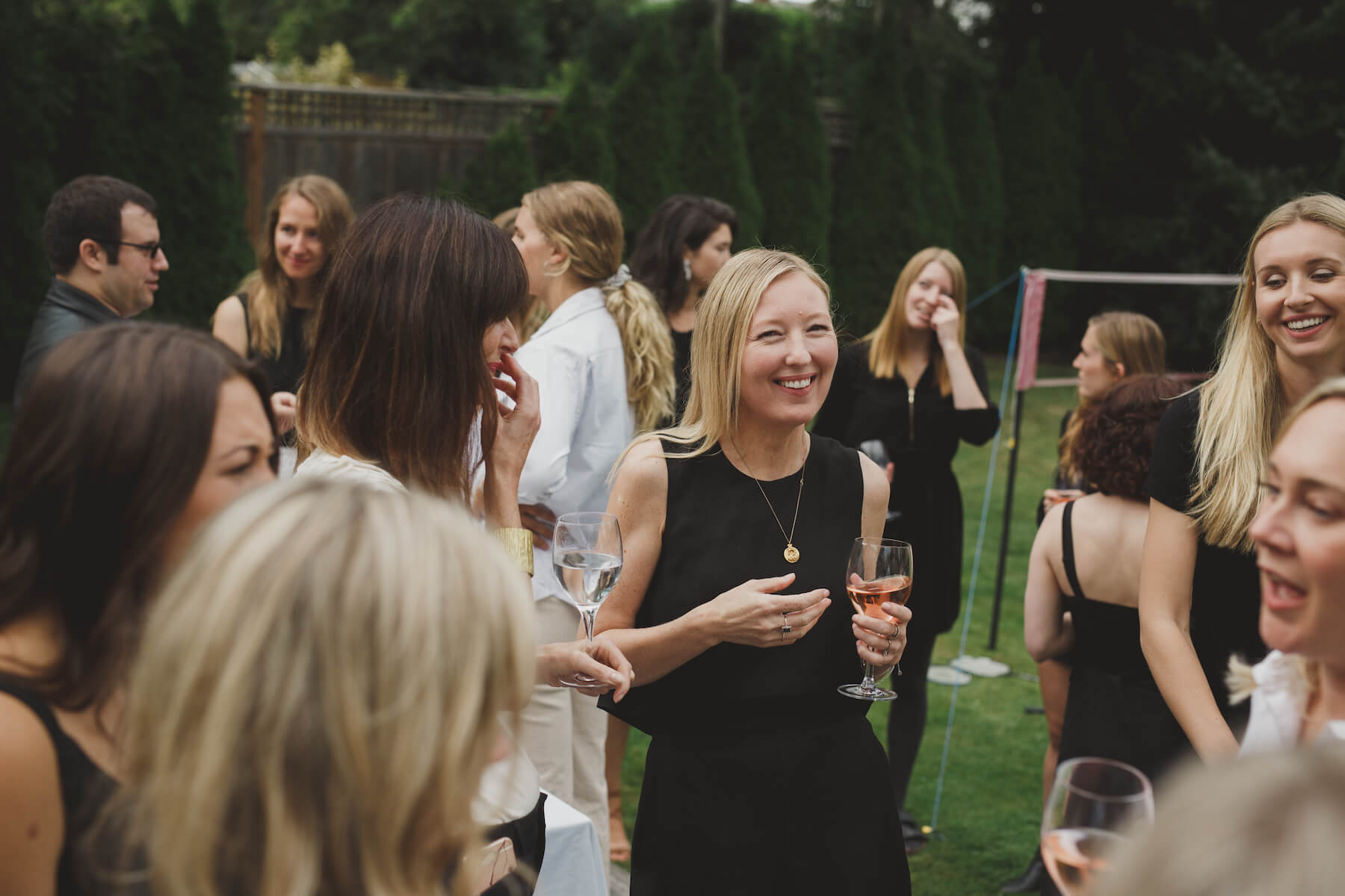 cocktails with the group at the garden party