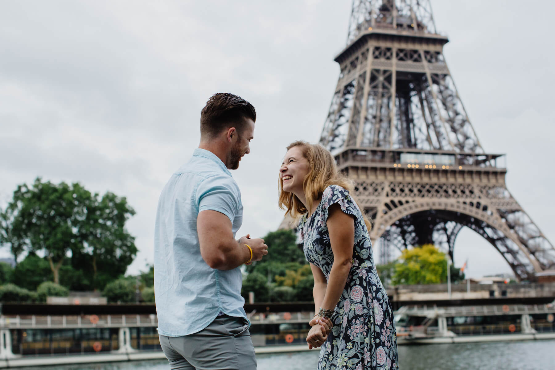 epic paris proposal, couple in front of the Eiffel Tower in Paris, France