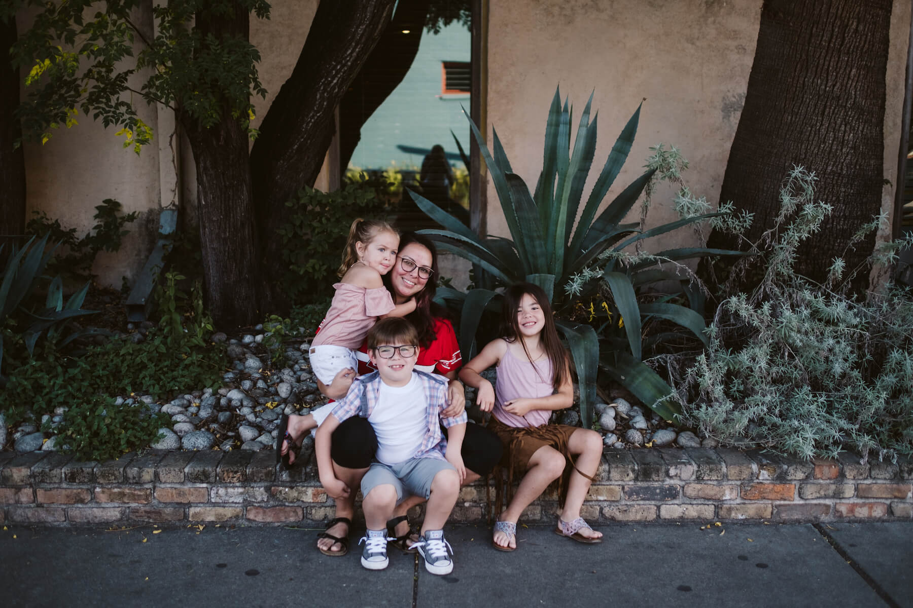 a family with two kids walking and having fun in Houston, Texas, USA