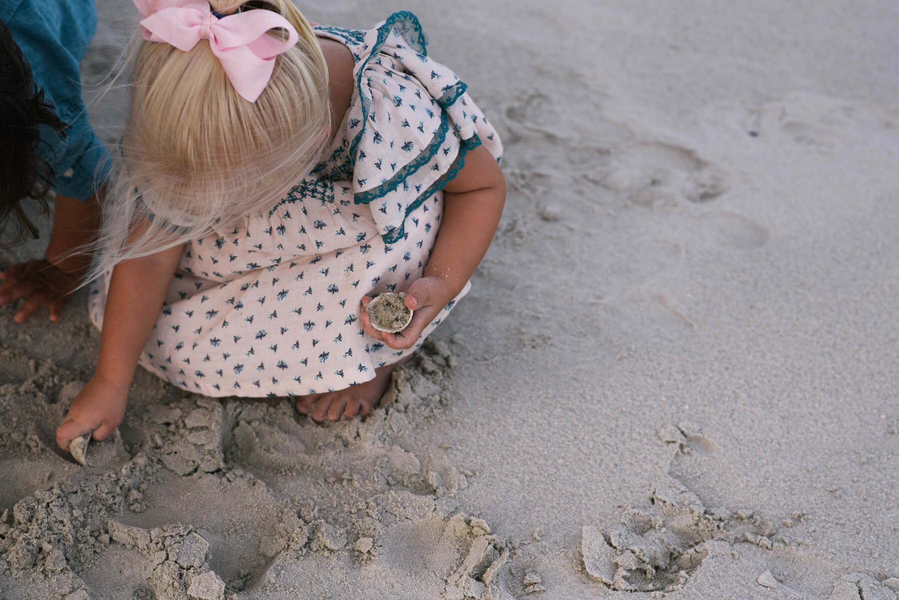 a closeup of a little girl on the beach in Savannah, Georgia, United States of America