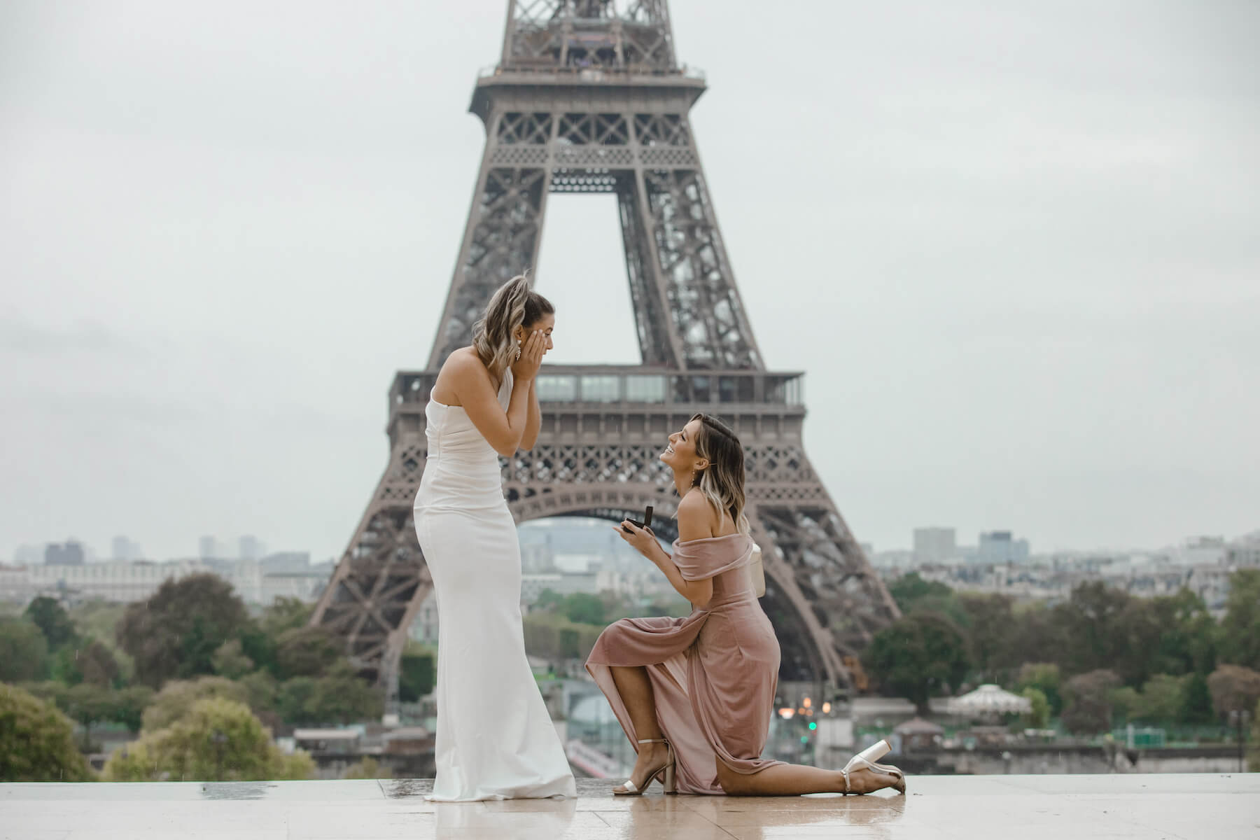 A woman proposing to a woman at Trocadero and the Eiffel Tower on a Flytographer photoshoot