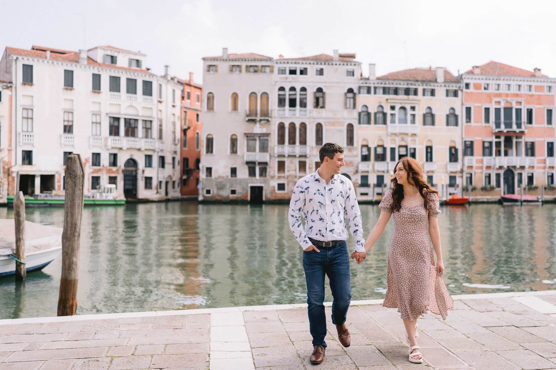 A couple holding hands in Venice Italy